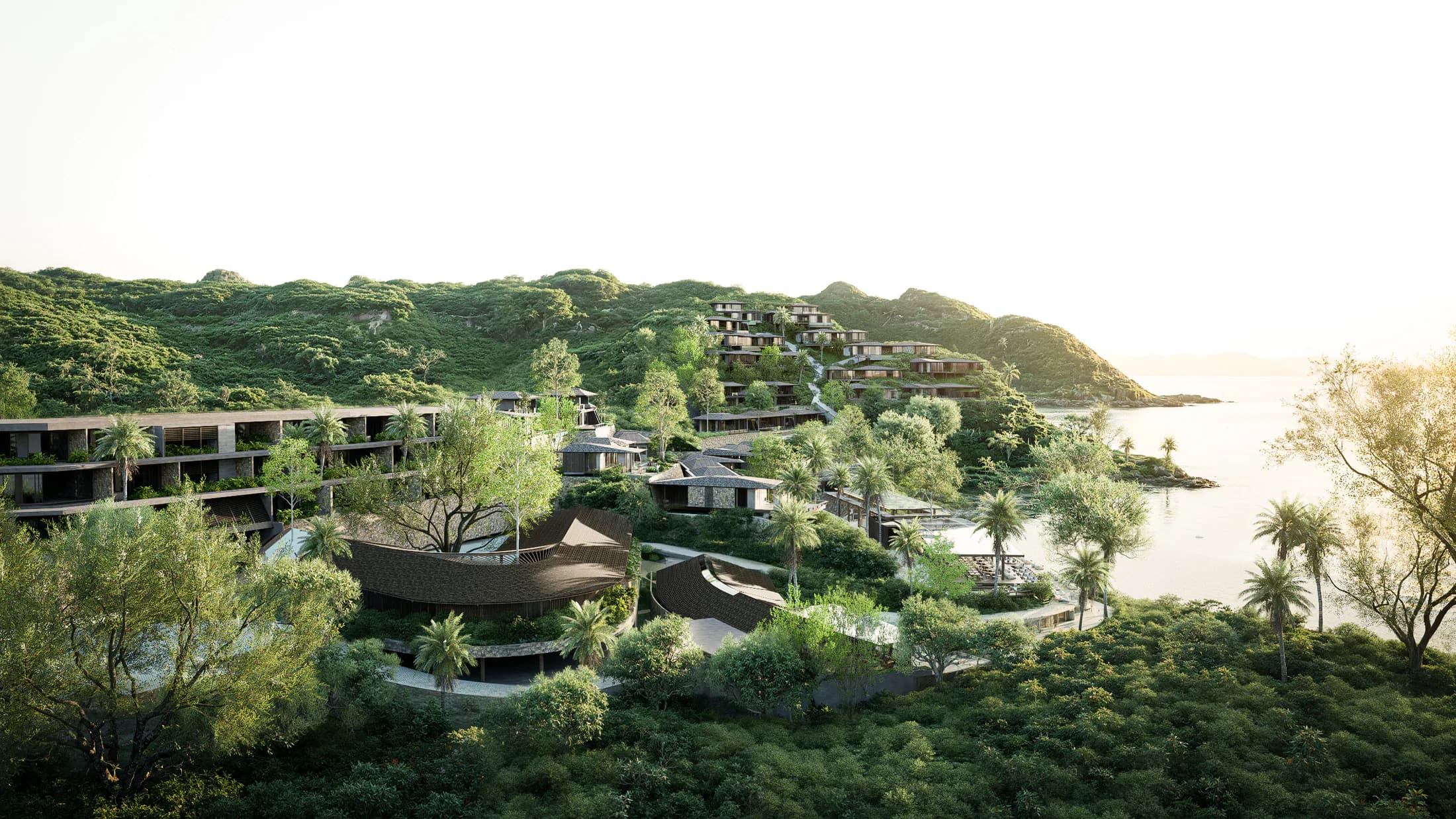 Villa's van AURAH geïntegreerd in de groene heuvels rond Tampah Bay aan de zuidkust van Lombok.