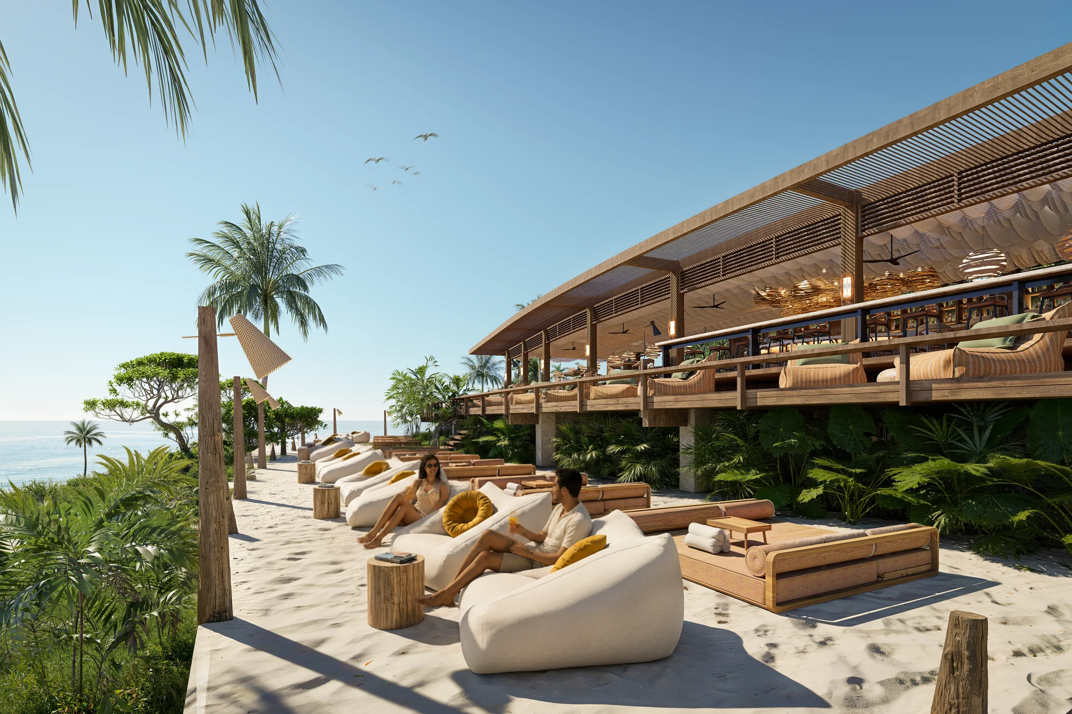 Zonnedek van AURAH met ligbedden, tropische beplanting en het open restaurant op de achtergrond.